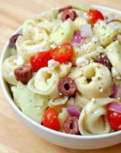 http://www.happygoluckyblog.com/wp-content/uploads/2016/10/Greek-Tortellini-Salad-3-238x300.jpg