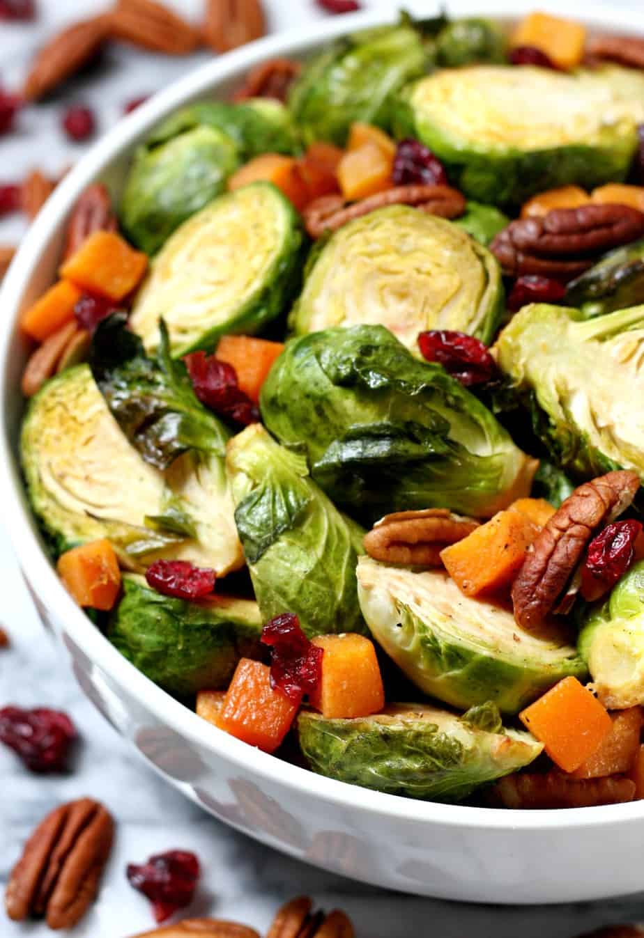 https://www.happygoluckyblog.com/wp-content/uploads/2017/11/Maple-Roasted-Brussels-Sprouts-and-Butternut-Squash-2.jpg